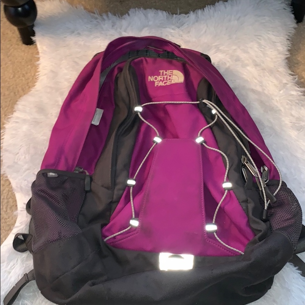 Purple north face book bag